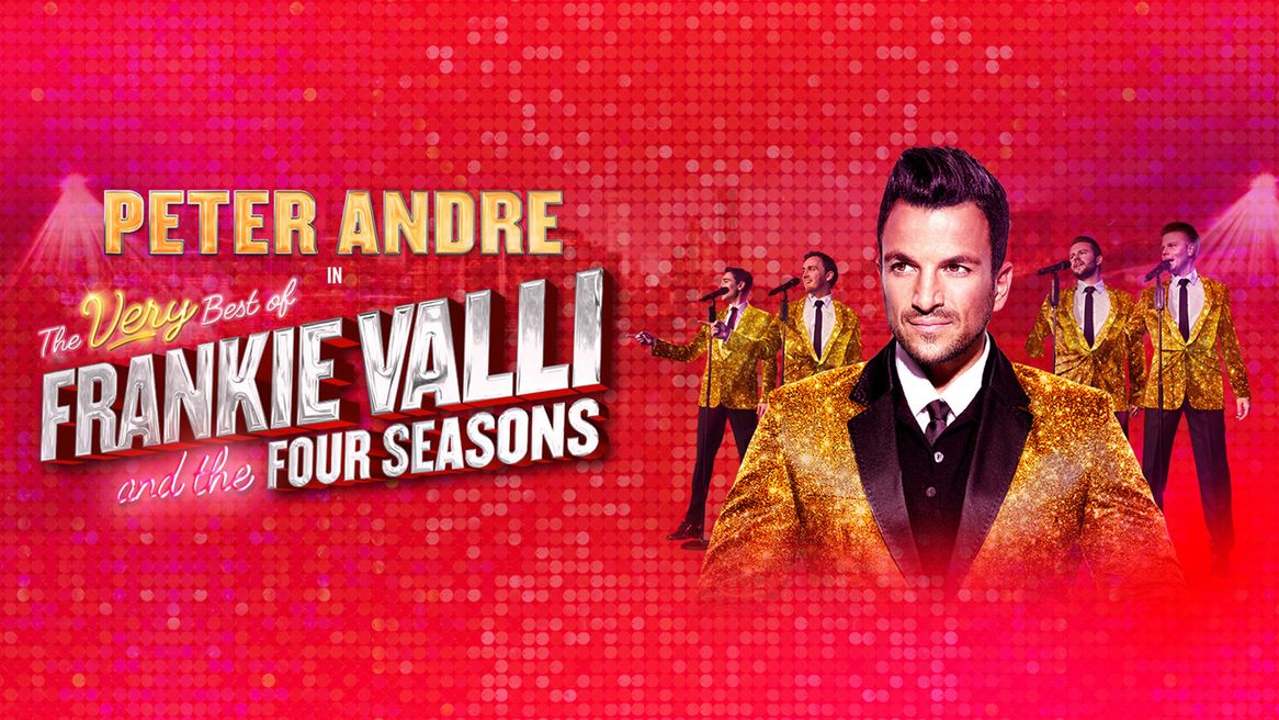 Peter Andres dressed in gold sparkley suit stands in front of a red background featuring four singers all ready to perform