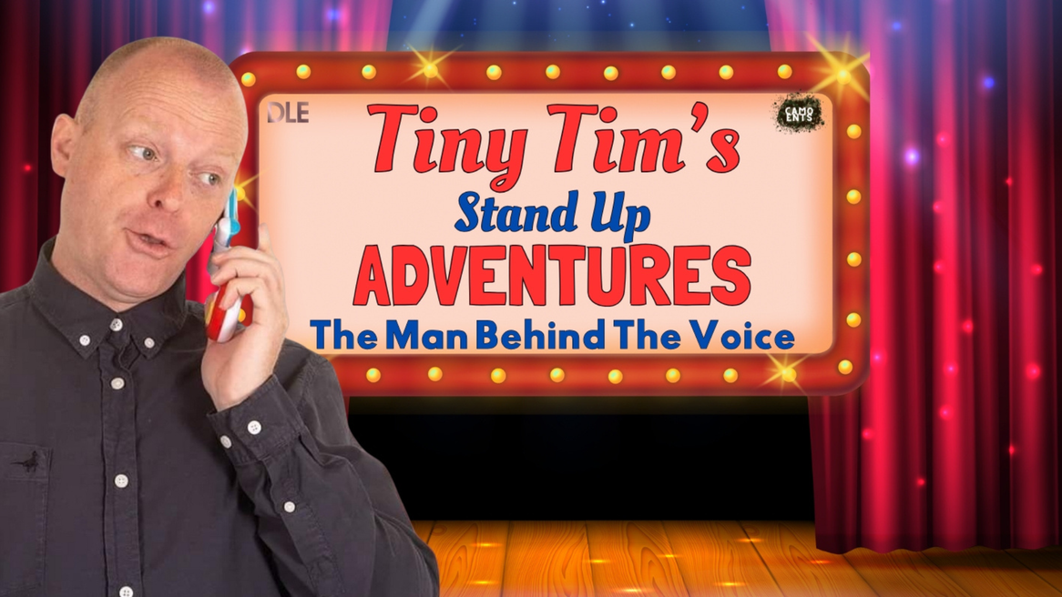 A man speaks into a children's toy phone on a stage