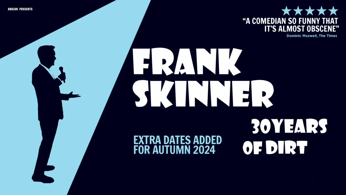 A silhouette of Frank Skinner highlighted by a blue spotlight